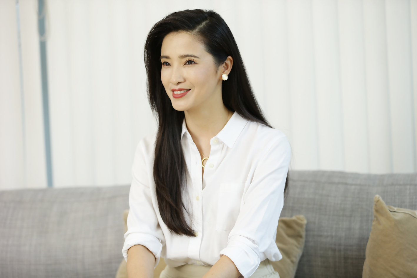 Gong Beibi on couch